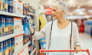 woman inspecting nutrition label